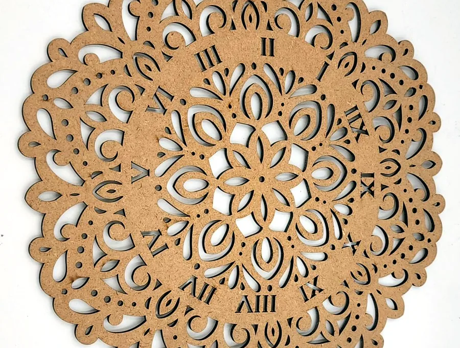 Intricate laser-cut decorative clock face