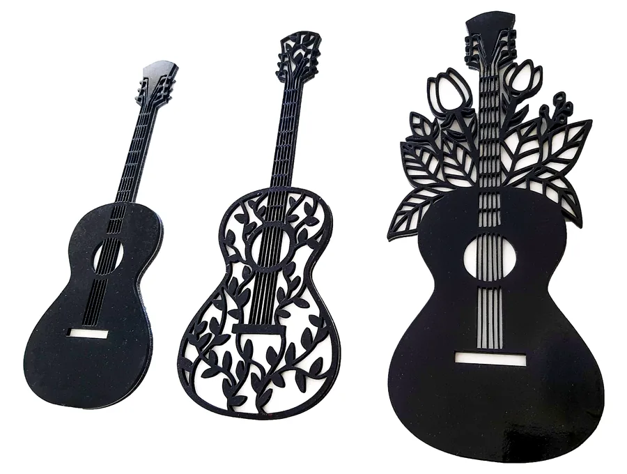 Laser-cut decorative guitar display pieces in wood and black finish